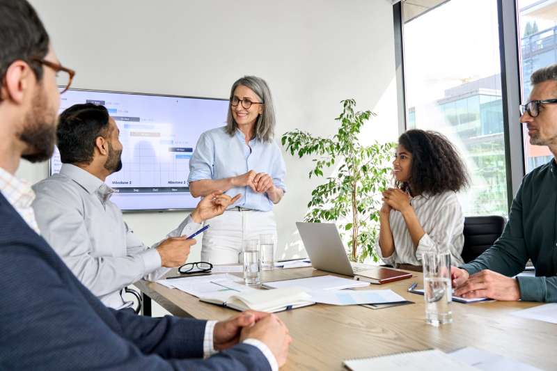 Work Presentation A legal professional delivers a presentation to her colleagues about an an alternative business structure
