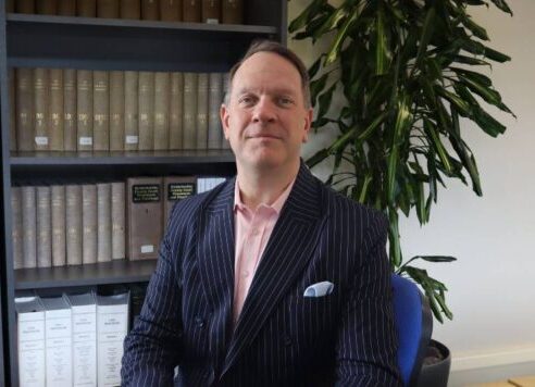 An image of Harvey Harding, the Managing Director of the PM Law Group