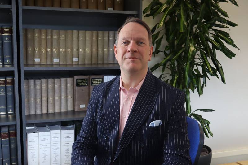 An image of Harvey Harding, the Managing Director of the PM Law Group