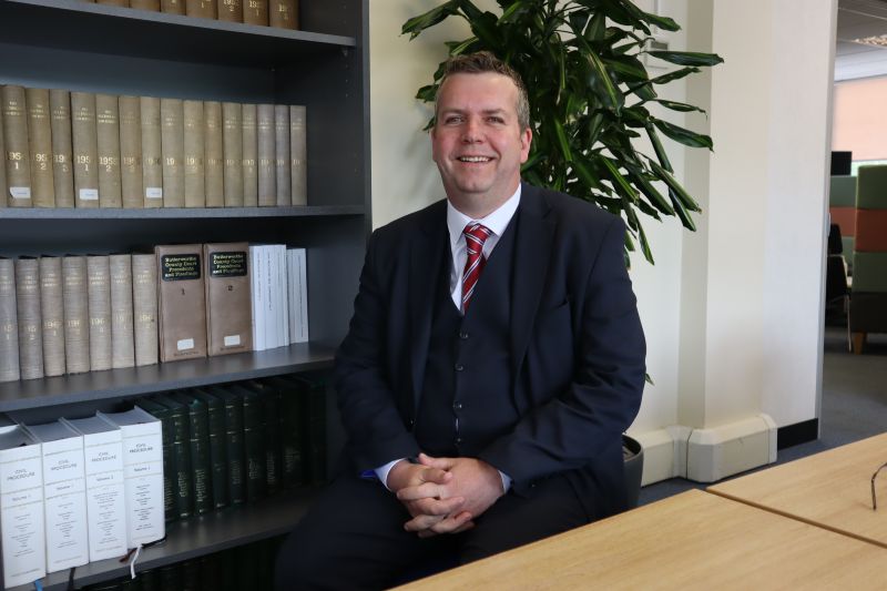 An image of Jon Bostock, the CEO of the PM Law Group