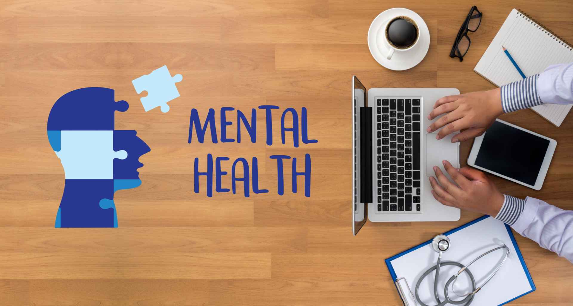 An aerial view of a man working at his desk, with the words 'mental health' written in bold beside him