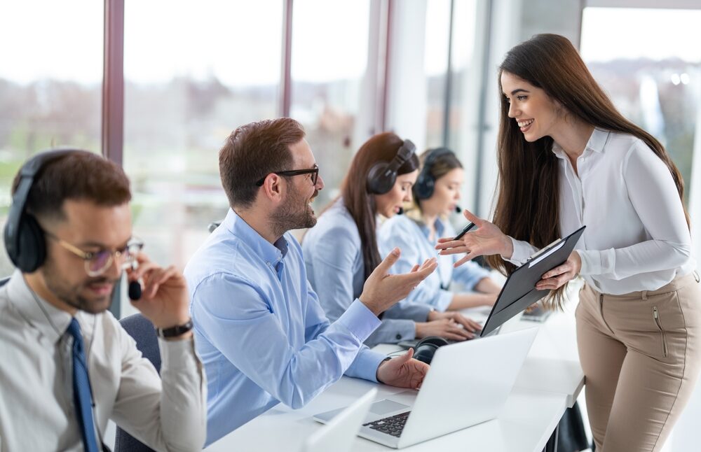 Professional,Businesswoman,Leading,And,Supervising,A,Group,Of,Call,Center