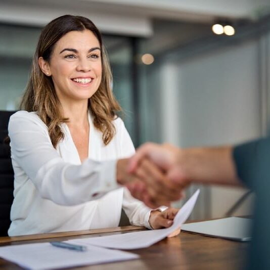 Interview An interviewee shakes the hand of a legal professional after being interviewed for current vacancy