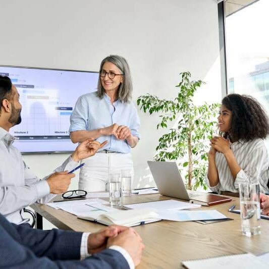 Work Presentation A legal professional delivers a presentation to her colleagues about an an alternative business structure